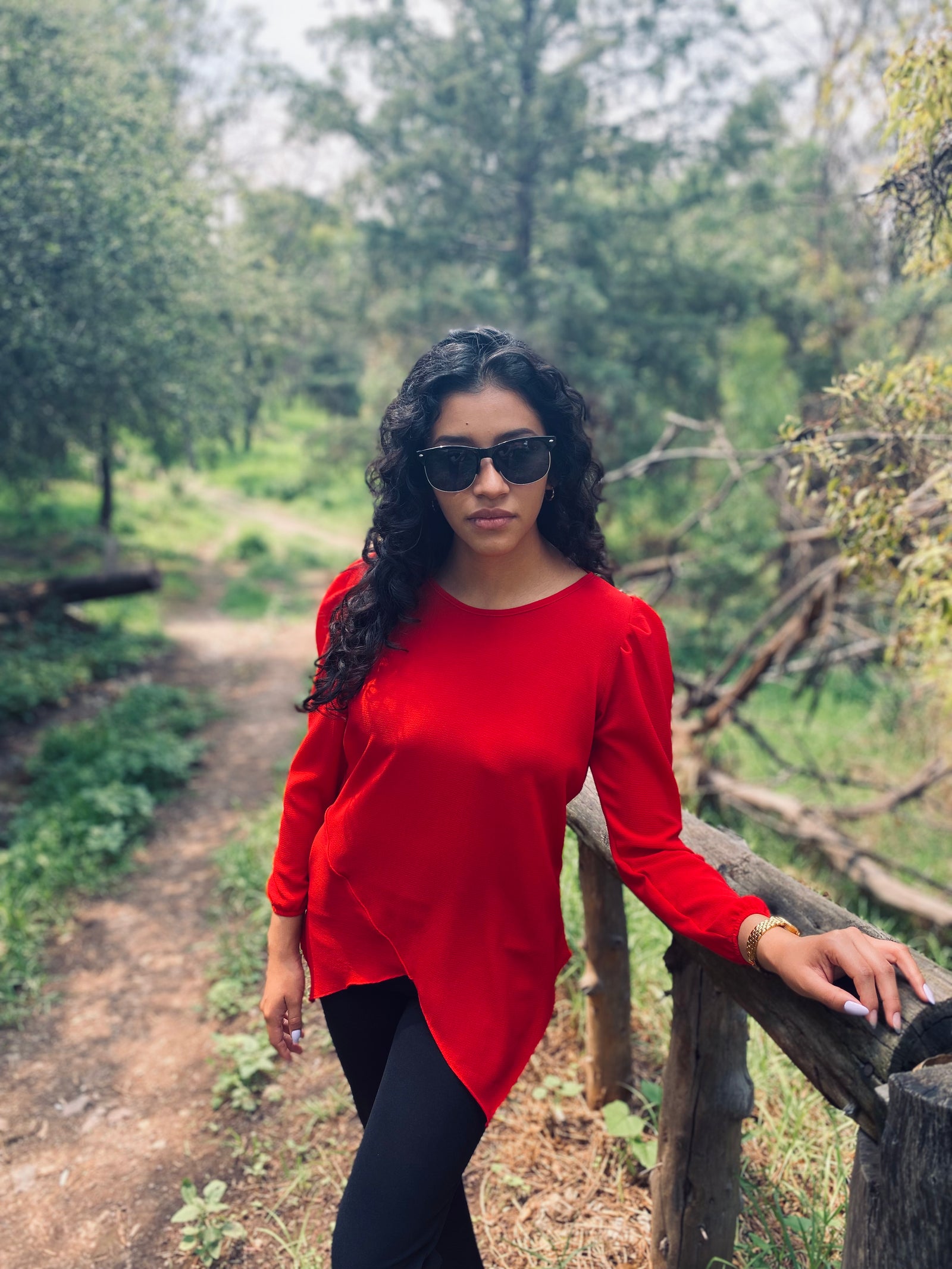 Blusa asimétrica manga larga