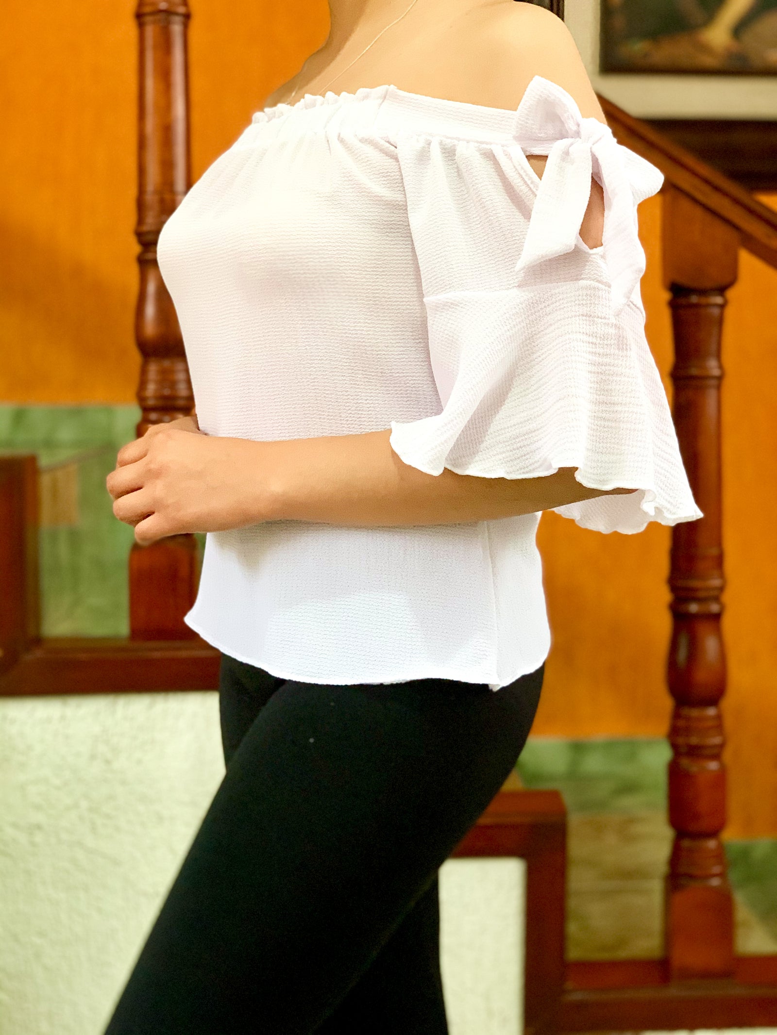 Blusa campesina con moños a los lados color blanca.